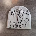 Detailed knit texture of a beanie with Where Is Love graffiti text on a stone background - M (52-58cm) / Gray with Black Letter