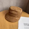 Close-up of brown suede fisherman hat with pleated texture and golden heart metal buckle - M (55-59cm) / Camel
