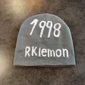 Close-up of the knitted texture with 1998 embroidery on a gray street style beanie hat - M / Gray