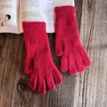 Detailed close-up of thick rose red rabbit fur knit gloves with warm ribbed cuffs - One Size / Red