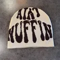 Detailed knit texture of a cream beanie featuring dark jacquard AINT NUFFIN lettering - M (52-58cm) / Khaki
