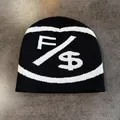 Close-up of black knitted beanie featuring white F and dollar sign embroidered design - M (54-59cm) / Black