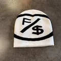 Detailed close-up of white knitted beanie with black dollar sign and F symbol jacquard - M (54-59cm) / White