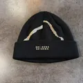 Detailed view of black knitted beanie with white wave patterns and SHI DENG embroidery - M (55-59cm) / Black