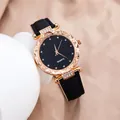 Close-up of starry dial quartz watch with rhinestones and black leather strap - Black