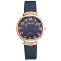 Detail of rose gold case with crystal accents and blue leather strap on quartz watch - Earth Pattern Dark Blue