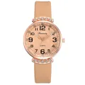 Detailed close-up of rose gold watch face with wave texture and crystal accents - Wave Pattern Beige