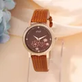 Elegant women's watch with brown floral dial, rose gold case and leather strap on silk background - Brown