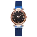 Detail of rose gold starry sky watch dial with blue magnetic milanese stainless steel mesh band - Single Watch / Blue