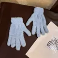 Detail shot of light blue coral fleece gloves showing soft plush texture and elastic wrist - Adult / Blue