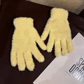 Detailed close-up of soft coral fleece gloves in cream yellow showing plush texture - Adult / Yellow