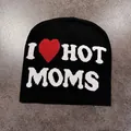 Detail showing the intricate jacquard knitting of the black I Heart Hot Moms beanie hat - I ❤️ HOT MOMS Style / Black