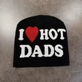 Close-up of black knit beanie with woven I Love Hot Dads text and red heart graphic - I ❤️ HOT DADS Style / Black
