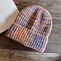 Close-up of a chunky knit beanie featuring colorful gradient yarn on a wood background - M(55-59cm) / Purple-Orange