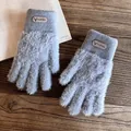 Detail view of grey faux mink fur gloves with warm fleece lining and deer head leather patch - One Size / Blue