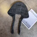 Detailed close-up of dark grey knitted balaclava with long ties on a stone background - M (55-59cm) / Dark Gray