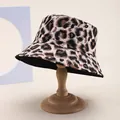 Detail of leopard print bucket hat on a wooden stand with a soft beige background - M (55-58cm) / White Coffee