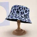 Blue leopard print reversible bucket hat for outdoor sun protection on display stand - M (55-58cm) / White Blue