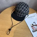 Λεπτομέρεια καπέλου 5-panel με καρό σχέδιο, μαύρο γείσο και ρυθμιζόμενο κορδόνι - Ρυθμιζόμενο / Ασπρόμαυρο καρό / Μαύρο