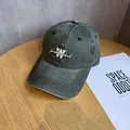 Detailed embroidery of letter W and for all mankind on washed cotton baseball cap - Adjustable / Army Green