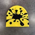 Dettaglio della trama a maglia di un berretto giallo con motivo a stella nera - M (52-58cm) / Giallo