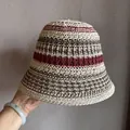 Detail of handwoven bucket hat with color-block stripes and breathable hollow texture - M / Burgundy