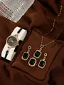 Detail of quartz watch and jewelry set with black gems and crystals on silk fabric - Square Watch Necklace Ring Earrings / Black