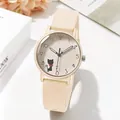 Detail of cute black cat illustration on cream silicone strap quartz wrist watch face - Off White