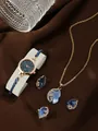 Elegant gold quartz watch set with blue teardrop crystals for women 5-piece set - Peacock Style Watch Necklace Ring Earrings / Blue