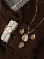 Women quartz watch set with necklace, earrings and ring in rose gold finish - Peacock Style Watch Necklace Ring Earrings / Pink
