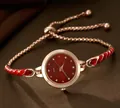 Elegant rose gold women's watch with dark red dial and adjustable chain strap - Watch Only / Red