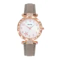 Women's quartz watch featuring a starfish dial, rose gold case, and grey suede strap - Gray (Matte)