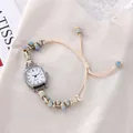 Montre bracelet élégante pour femme avec boîtier carré en argent et cordon perlé tissé - Index Carrés Blanc