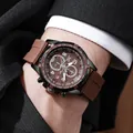 Detailed view of men's brown silicone watch with tachymeter bezel on a wrist - Black Case Coffee Dial