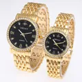 Close-up of golden quartz watches with diamond bezels and five-link steel bands - Men's Gold Black Dial