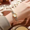 Elegant vintage oval quartz watch for women with dual-tone chain bracelet and crystal scale - Gold & Silver
