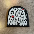 Dettaglio del berretto in maglia nera con jacquard GRITY VISIONS bianco e stelle rosse - M (54-59cm) / Grigio nero