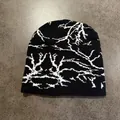 Detail of gothic bone pattern jacquard on black and white knit beanie for winter - Wire Pattern Black