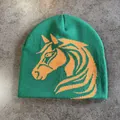 Detail of green knitted beanie with orange horse head jacquard texture and pattern - M (52-59) / Green
