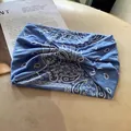 Light blue paisley bandana headband with twist knot design for yoga and sports - Light Blue