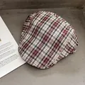 Detailed view of vintage plaid pattern and fabric texture on a flat-brimmed newsboy hat - One Size / White Red Plaid