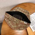 Detailed close-up of retro plaid beret featuring bronze buckle and woven fabric texture - Adjustable / Dark Orange