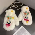Detail of plush winter mittens with colorful pom-poms and a cute cartoon smiley face - One Size / White (Clown Style)