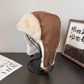 Brown faux suede trapper hat with white faux fur lining and ear flaps for winter - Coffee