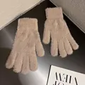 Macro detail of soft light brown faux fur gloves with elastic ribbed wrist cuffs - Khaki