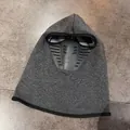 Detail of grey winter balaclava mask showing breathable air flow valve and warm fleece fabric - One Size / Dark Gray
