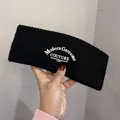 Black knitted wide headband with white Modern Garcome Paris letters for winter sport - Black