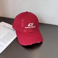 Distressed burgundy baseball cap with white G embroidery and stylish ripped details - Adjustable / Burgundy