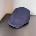 Detailed close-up showing navy blue canvas stitching on a vintage British flat cap - M / Navy Blue