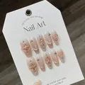 Handmade cat-eye press-on nails in nude pink with pearls and sparkling rhinestones - XS / 946 Blush Cat Eye Long Coffin